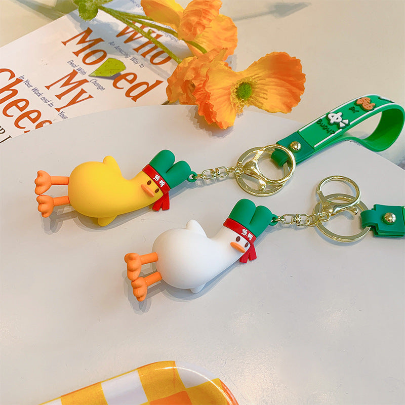 Wholesale PVC Tilted Head Little Yellow Duck Doll Keychain